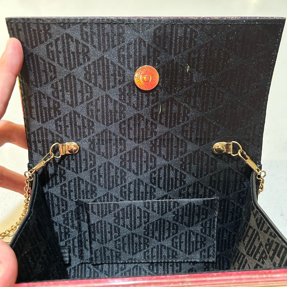 Kurt Geiger Rainbow Glitter Stripe Clutch with Gold-tone Embellishment - Picture 5 of 7